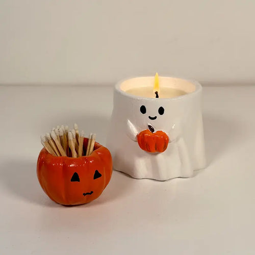 Halloween-themed candle and match holder with Sculpd Candle Making Kit