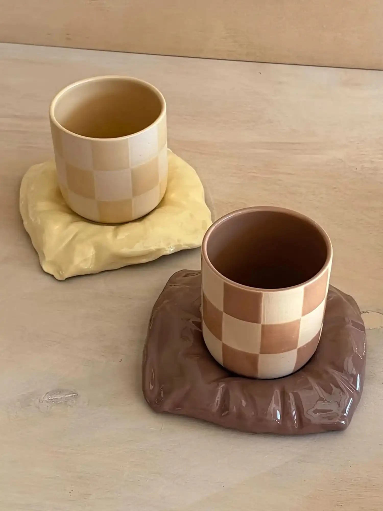2 checkered cups made with Sculpd pottery kit